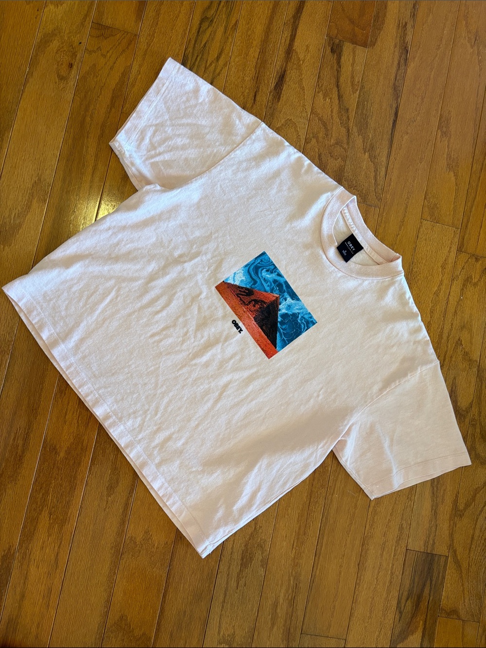 Obey Light Pink Tee with Blue Wave and Orange Surf Graphic small